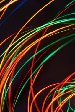 Soyut dinamik arkaplan, renkli canlı ışıklar hareket halinde.