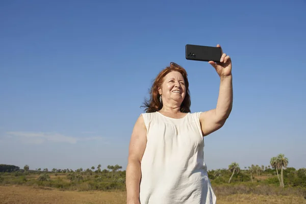 Hispanic Mature Woman Making Selfie Her Phone Palmar National Park — Fotografia de Stock