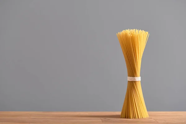Pasta Bunch Raw Spaghetti Wooden Table Italian Food Concept Minimalistic — Zdjęcie stockowe