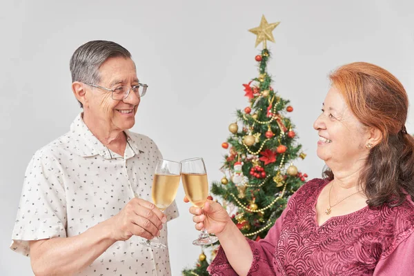 Happy Senior Hispanic Couple Toasting Christmas New Year Celebrating Holidays — Stock Photo, Image