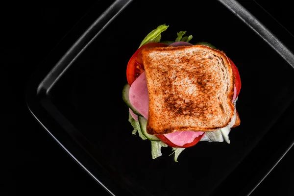 Sandwich isolated on black background — Stock Photo, Image