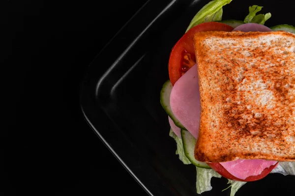 Sandwich isolated on black background — Stock Photo, Image