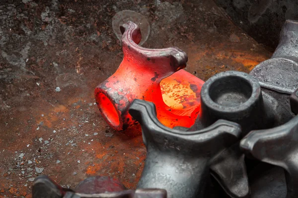 Hot steel ingot in the workspace — Stock Photo, Image