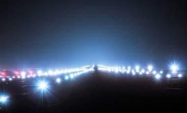 Landing lights at night clipart