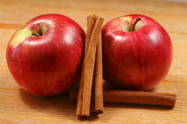 Two apples with cinnamon — Stock Photo, Image