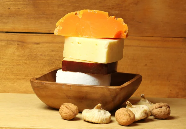 Cheese with figs and wallnuts — Stock Photo, Image
