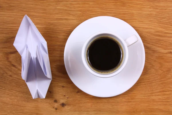 Coffee and paper bird — Stock Photo, Image