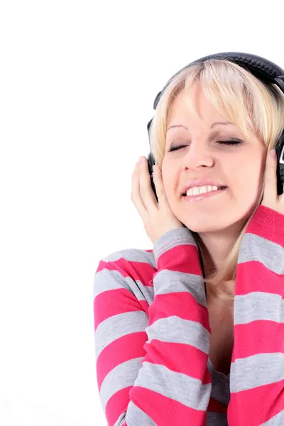 Chica con auriculares aislados sobre un fondo blanco —  Fotos de Stock