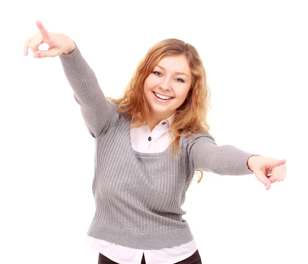 Porträt einer aufgeregten jungen Frau, die auf weißem Hintergrund auf dich zeigt — Stockfoto