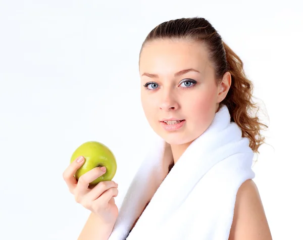 En vacker flicka med ett äpple, vit bakgrundkrásná dívka s jablkem, bílé pozadí — Stock fotografie