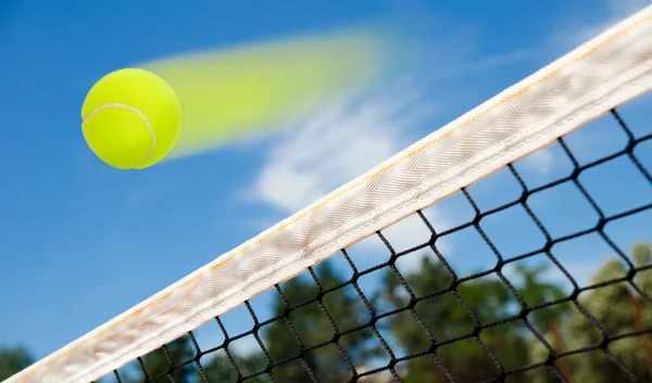 Tennis ball flying — Stock Photo, Image