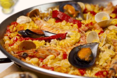 Spanish seafood rice paella, close up clipart