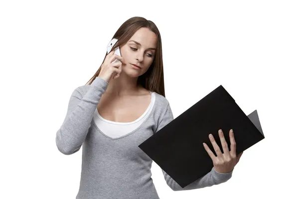 Woman with folder and mobile phone — Stock Photo, Image