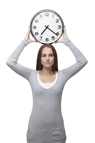 Clock above her head — Stock Photo, Image