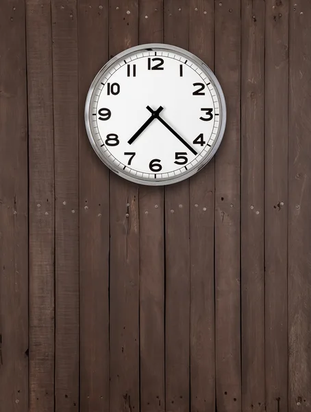 Clock on a wooden wall — Stock Photo, Image