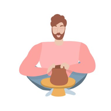 Men decorating pot on pottery workshop