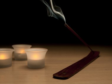 Incense stick and candles clipart