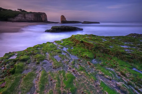 Salida del sol en Four Mile Beach — Foto de Stock