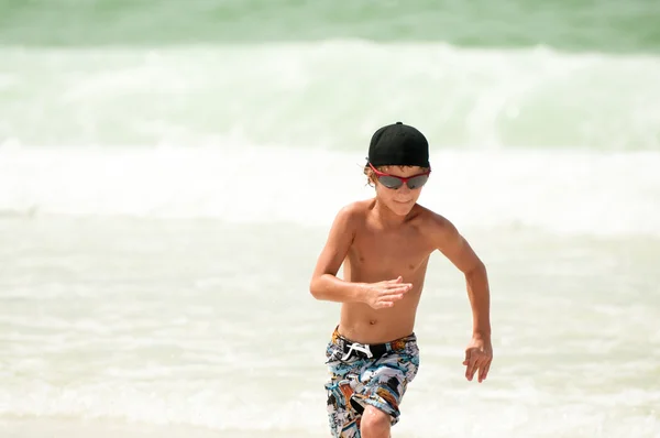 Young Boy Running in Ocean — Stock Photo, Image