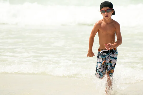 Young Boy Running in Ocean — Stock Photo, Image