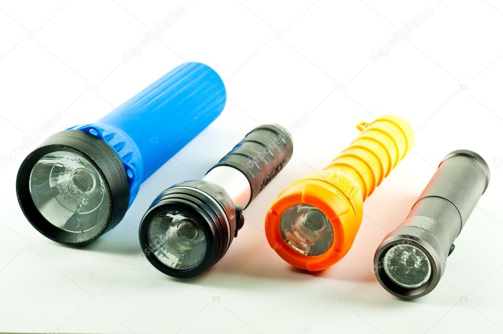 four-different-flashlights-on-white