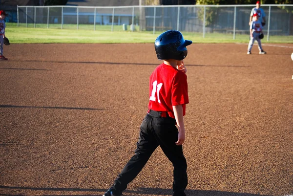 Baseball boy on third base — Stock Photo, Image