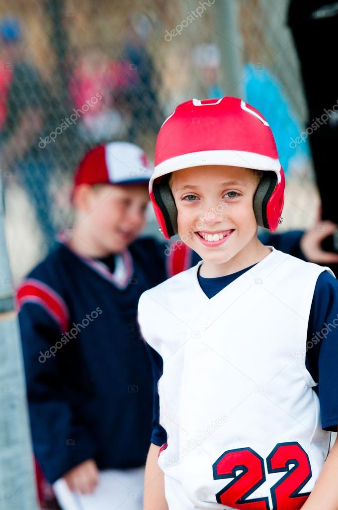 Little league baseball boy in dugout — Stock Photo © tammykayphoto