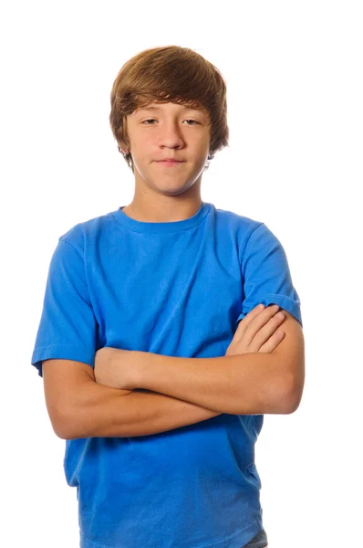 Young teen boy with arms crossed on white — Stock Photo, Image