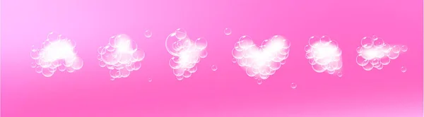 Kousky mýdlové pěny s bublinami izolovanými na růžovém pozadí. Horní pohled na jiskřivé šampon a koupelové pěny mraky. Vektor. — Stockový vektor