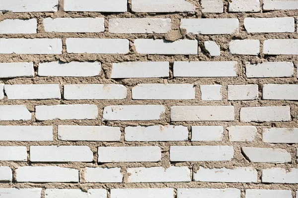 Wall of white bricks as a background