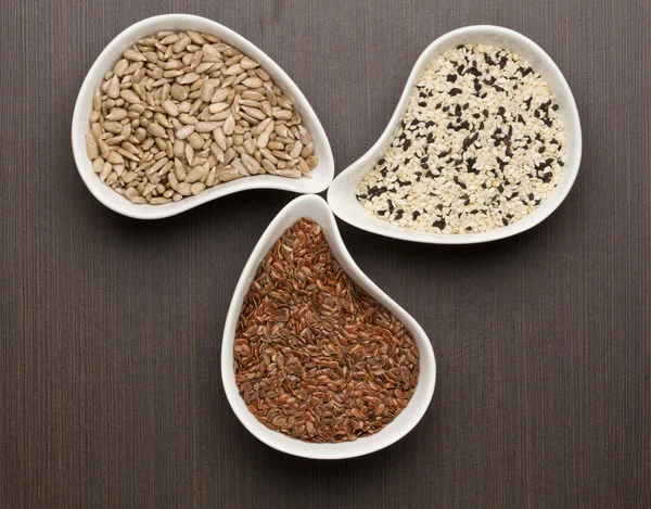 Sesame,flax and sunflower seeds — Stock Photo, Image