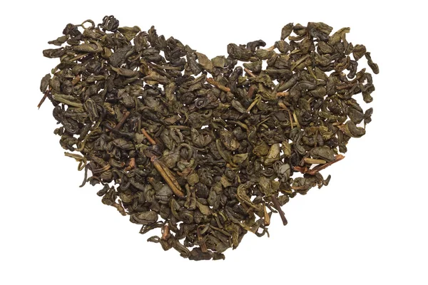 Heart symbol made from dried tea leaves — Stock Photo, Image
