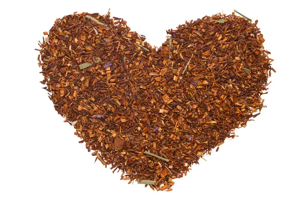 Heart symbol made from dried tea leaves — Stock Photo, Image