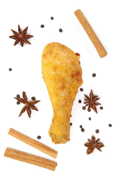 Palillo de pollo frito con hierba y picante sobre fondo blanco —  Fotos de Stock