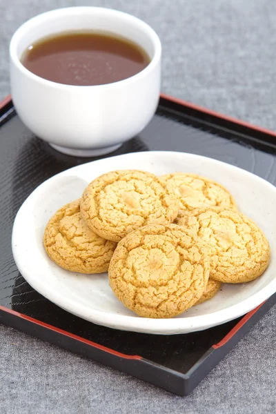 Galletas y café negro — Foto de Stock