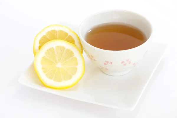 Kopp te med citronskiva — Stockfoto