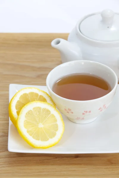 Kopp te med citronskiva — Stockfoto