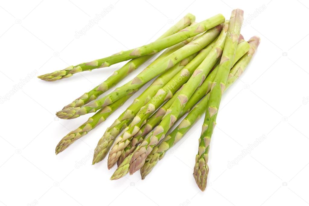 Fresh green asparagus isolated on white background