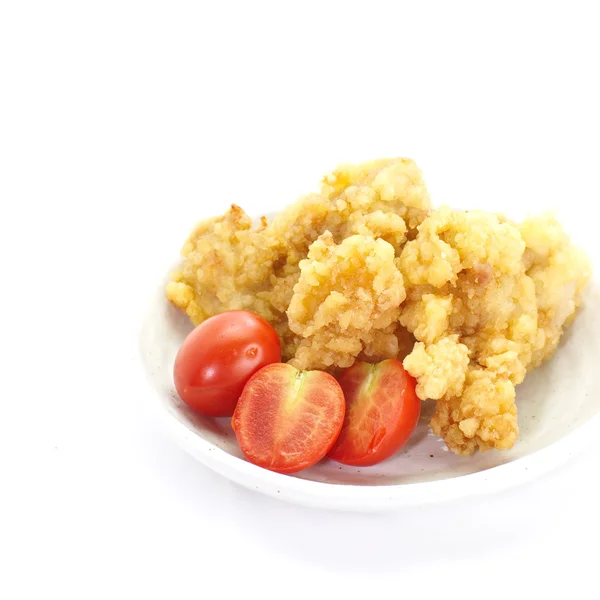 Fried chicken and tomatoes — Stock Photo, Image