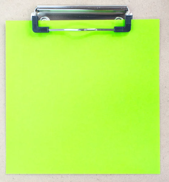 Clip board and green colored paper — Stock Photo, Image