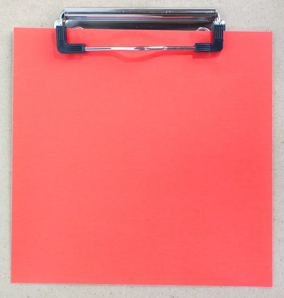 Clip board e carta di colore rosso — Foto Stock