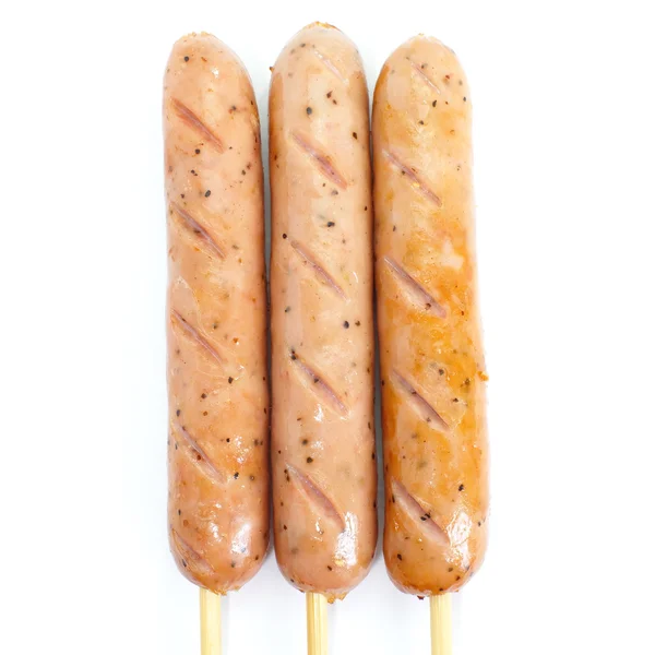 Sausage roll grilled on stick — Stock Photo, Image