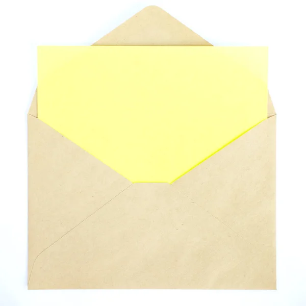 Geopende envelop met gele kleur papier — Stockfoto