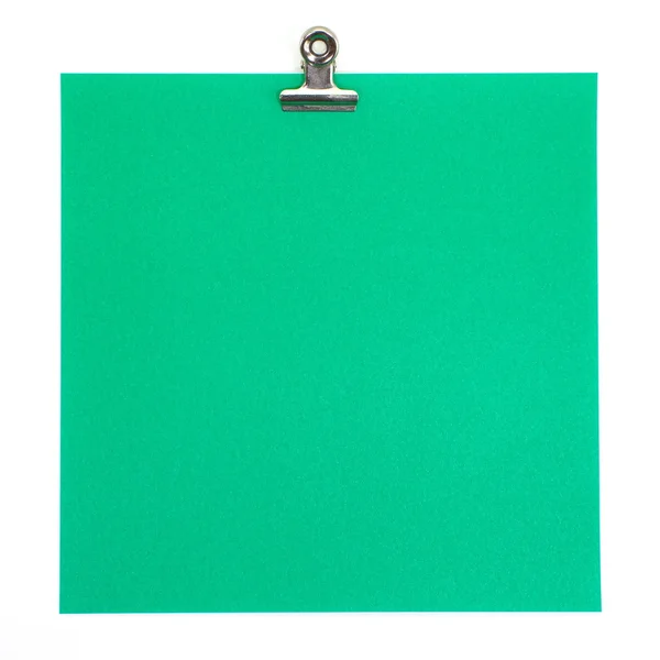 Green paper with clip — Stock Photo, Image