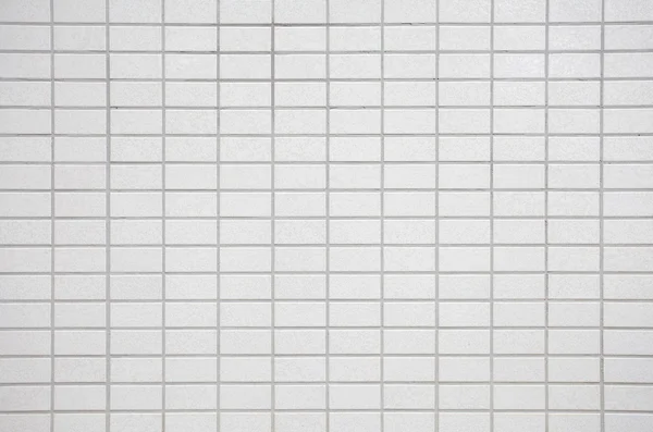 Moderne Wand aus weißen Betonfliesen — Stockfoto