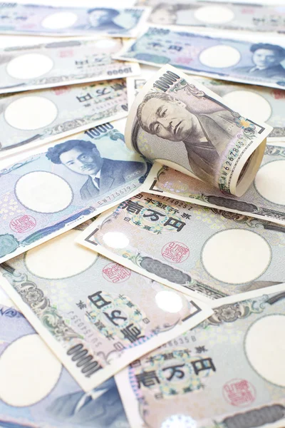 Закладають - грошова одиниця ієн, банкнот і монет — стокове фото