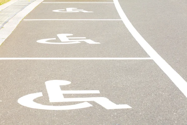 Several handicap parking areas reserved for disabled people Royalty Free Stock Photos