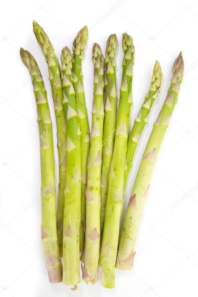 Fresh green asparagus isolated on white