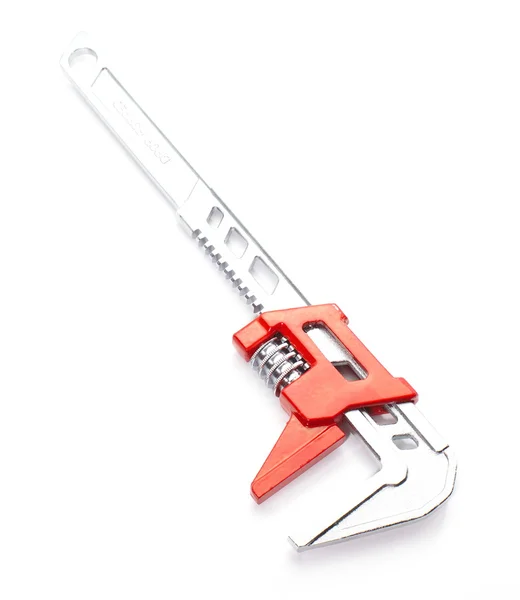 Adjustable spanner colored red for plumbing — Stock Photo, Image