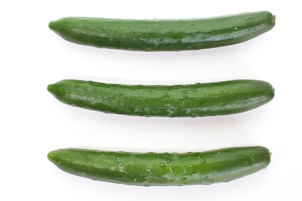 Three green cucumbers — Stock Photo, Image